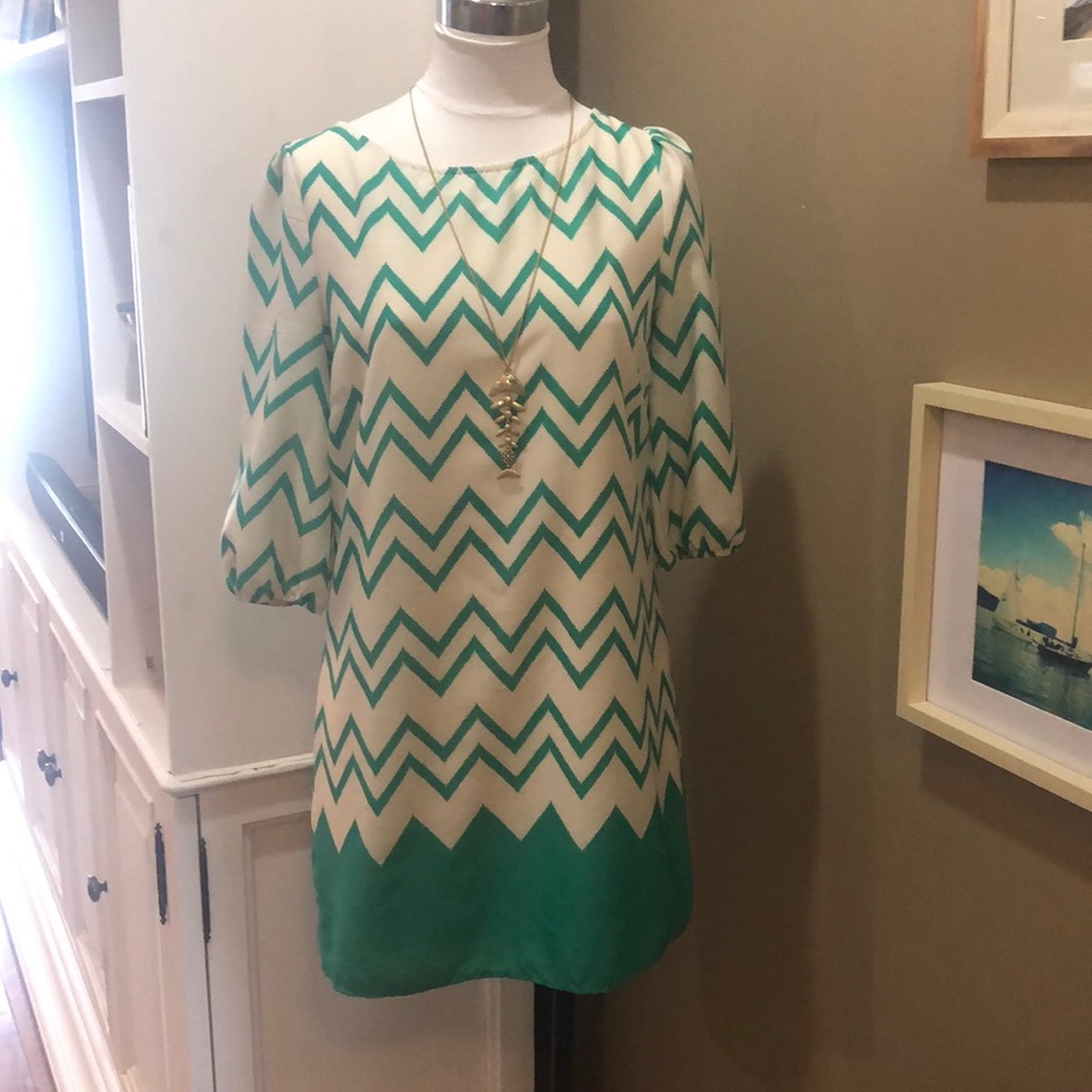 Quarter length sleeve dress
